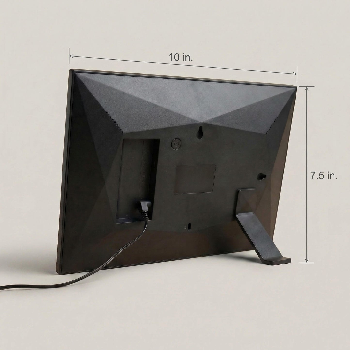 The sleek matte rear casing of a 10-inch black Family Frame digital picture frame, demonstrating its clean hardware dimensions and durable built-in kickstand. The engineered design of this corded electronic photo frame provides perfect stability for proudly displaying memories on any flat surface. This state-of-the-art HD digital photo display offers an elegant aesthetic that enhances home decor while connecting separated families.