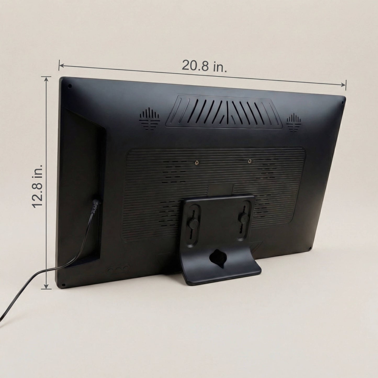 The textured black rear casing of a 20-inch black Family Frame smart picture frame, highlighting its slim hardware profile and secure mounting brackets. The durable construction of this electronic photo frame accommodates an easy-to-use rotating wall mount for proudly displaying memories in any orientation. This state-of-the-art HD digital photo display ensures a gallery-like aesthetic that enhances home decor while connecting separated families.