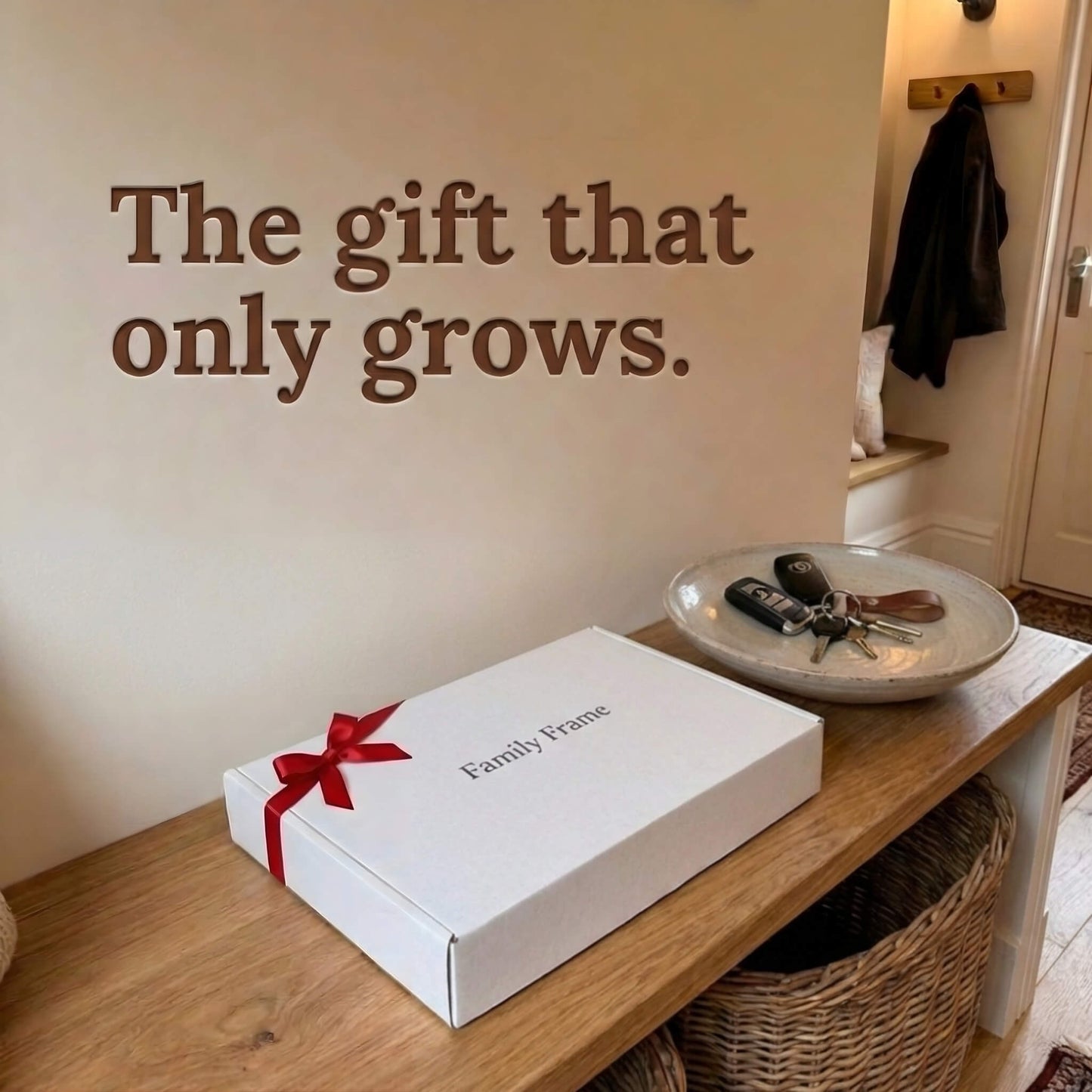 A 10-inch black Family Frame smart picture frame packaged elegantly in a white gift box with a red bow, sitting on a wooden entryway bench. Perfectly presented as a luxury long-distance family gift, this beautifully boxed WiFi photo frame is built to foster daily emotional connections. The premium electronic photo frame serves as a continuous digital memory display, updating effortlessly through its dedicated secure application.
