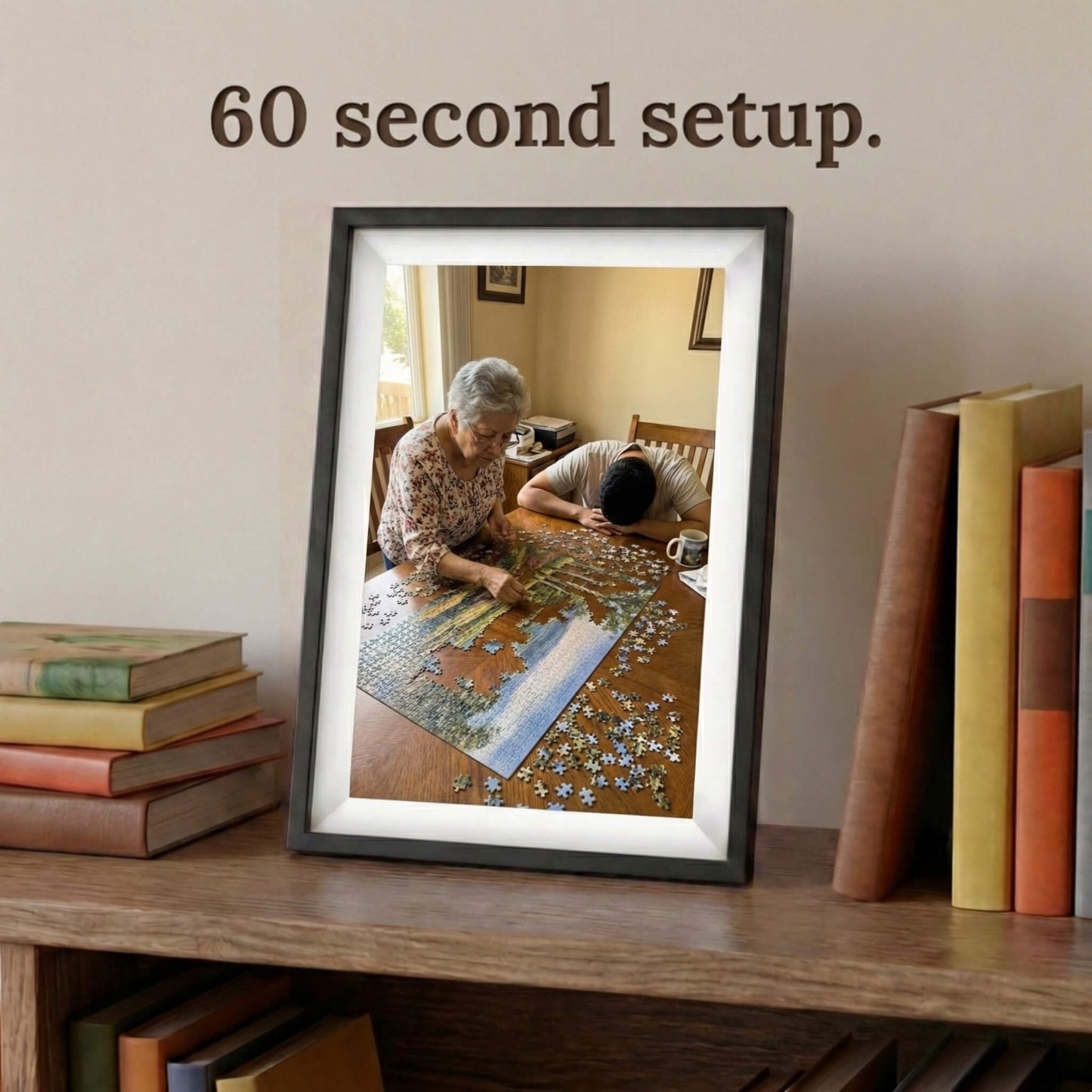 A 10-inch cordless classic black Family Frame electronic photo frame framed by a white mat, displayed prominently on a bookshelf beside stacked books. Prioritizing accessibility, this intuitive battery-powered smart picture frame boasts a frictionless, easy 60-second WiFi setup process that anyone can master. This no subscription fee digital frame ensures immediate and uninterrupted photo sharing for families of all technical backgrounds.
