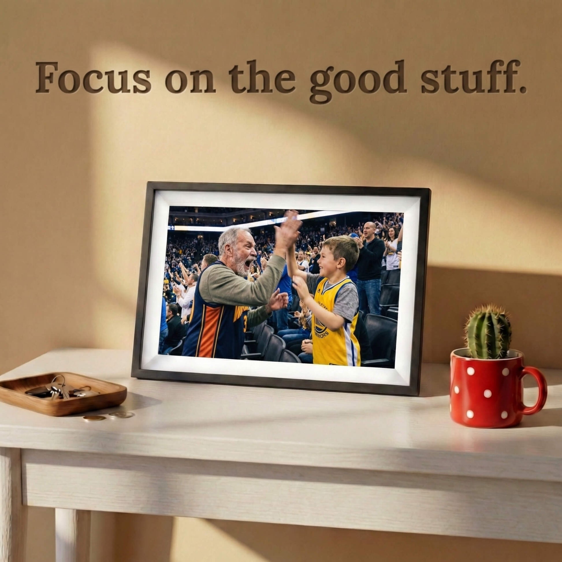 A 10-inch cordless classic black Family Frame smart picture frame featuring a pristine white mat, positioned neatly on a light wooden desk. Designed for vivid visual storytelling anywhere in the home, this cordless WiFi photo frame delivers a stunning high-resolution display that beautifully highlights the details of every uploaded image. Acting as a dedicated digital memory display, the battery-operated device bridges the physical distance between family members with a constant stream of new photos.
