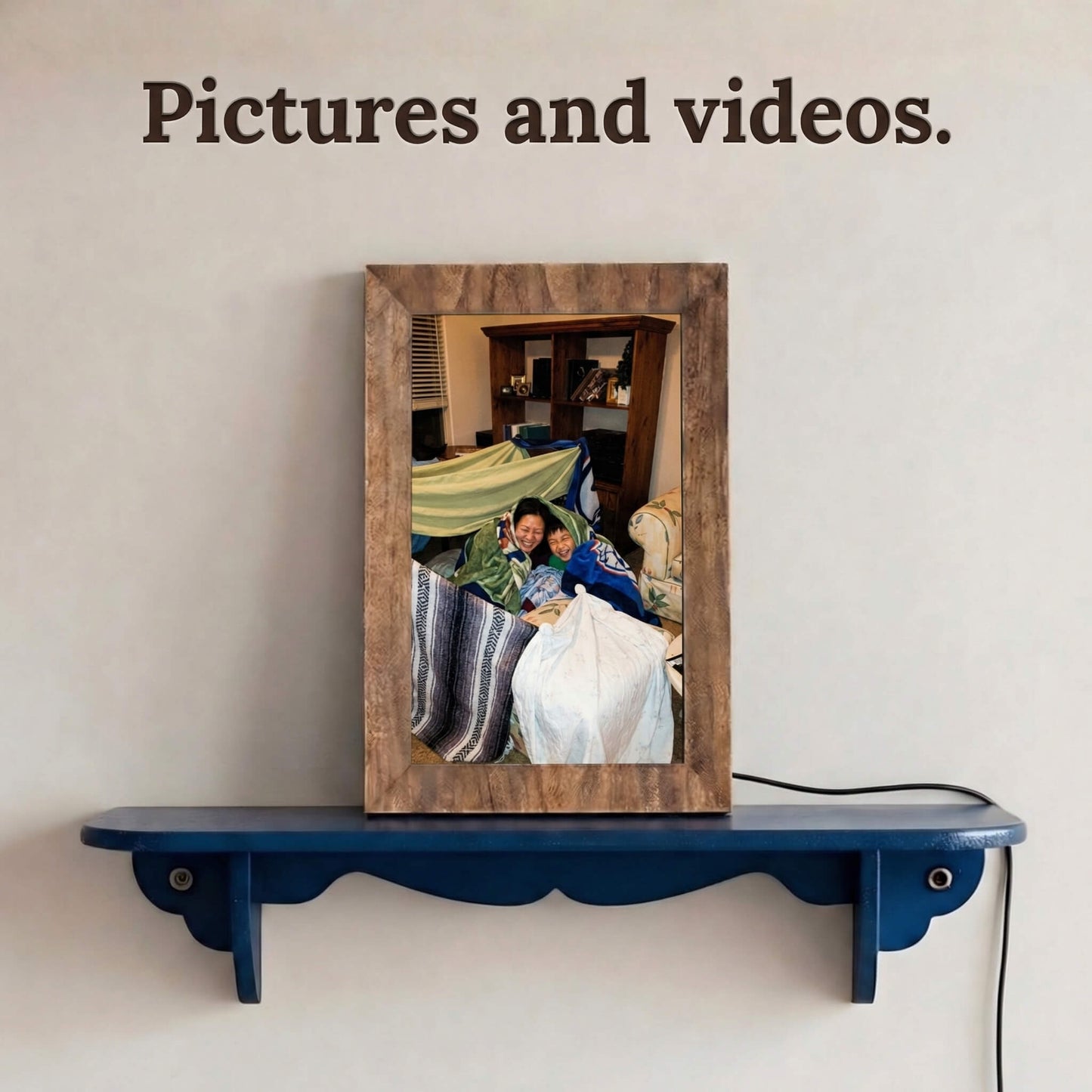 A vertically oriented 10-inch oak wood Family Frame digital memory display resting gracefully on a blue floating wall shelf. Equipped with advanced processing, this premium digital picture frame flawlessly handles both high-definition photo and video playback to capture full, immersive memories. The robust photo sharing frame allows distant relatives to securely send video messages directly to the heart of the home.
