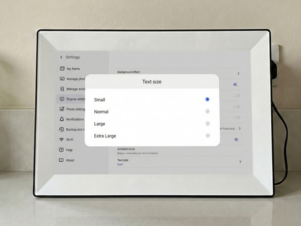Settings menu on an easy-to-use digital frame for grandparents, highlighting the adjustable text size feature that makes navigating preferences comfortable and accessible for all users.
